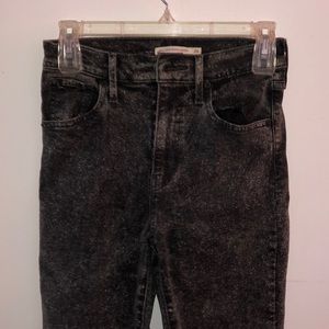 Levi jeans in a size 26 inches, paint pattern.